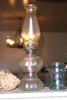 another glass oil lamp